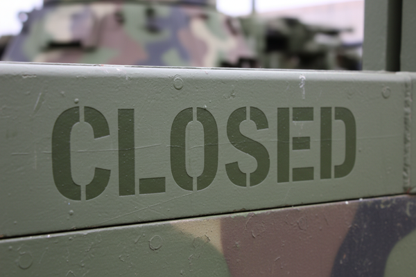 the word closed in military style text