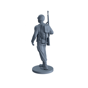 American Soldier Walking with Gun on Back